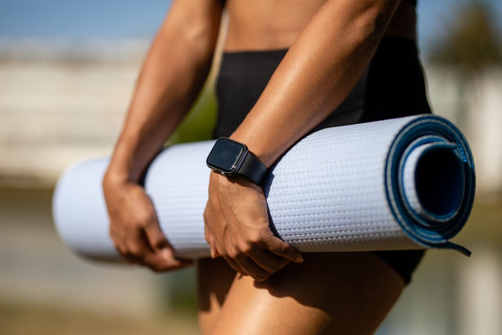 A Person in Black Shorts Wearing Apple Watch