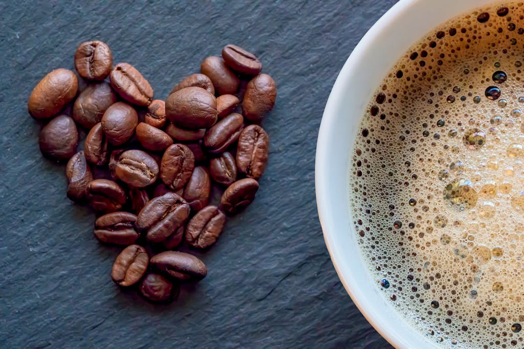 Heart Shaped Coffee Beans and Fresh Brew