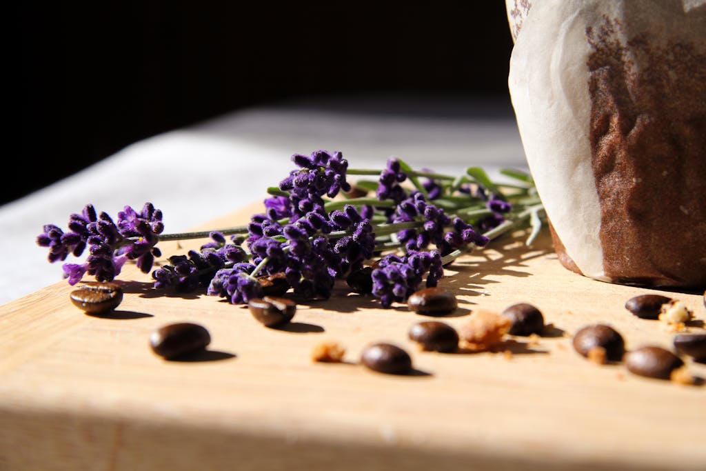 Aromatic lavender with coffee beans on a wooden board, creating a relaxing ambiance.